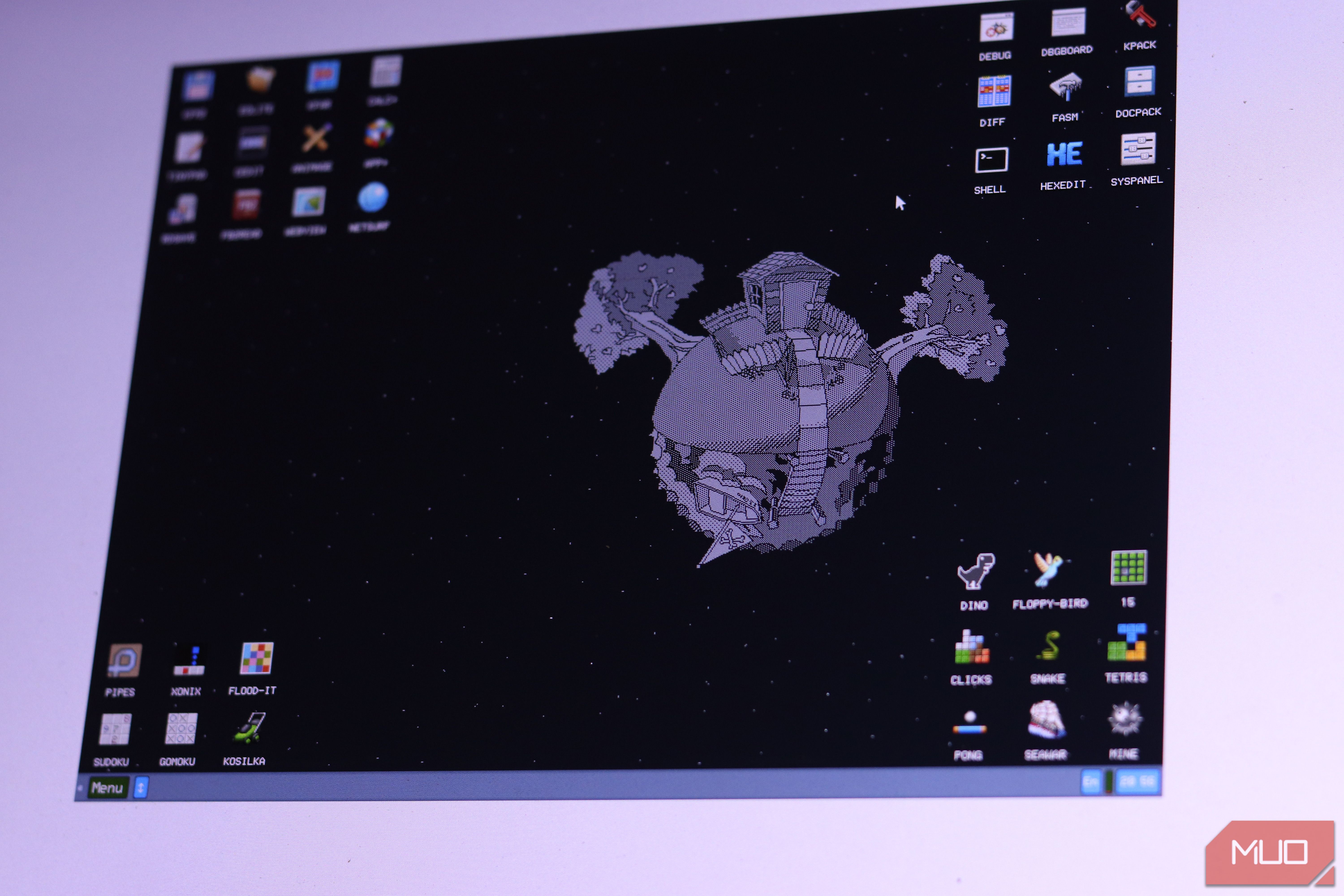KolibriOS desktop running in a virtual machine.