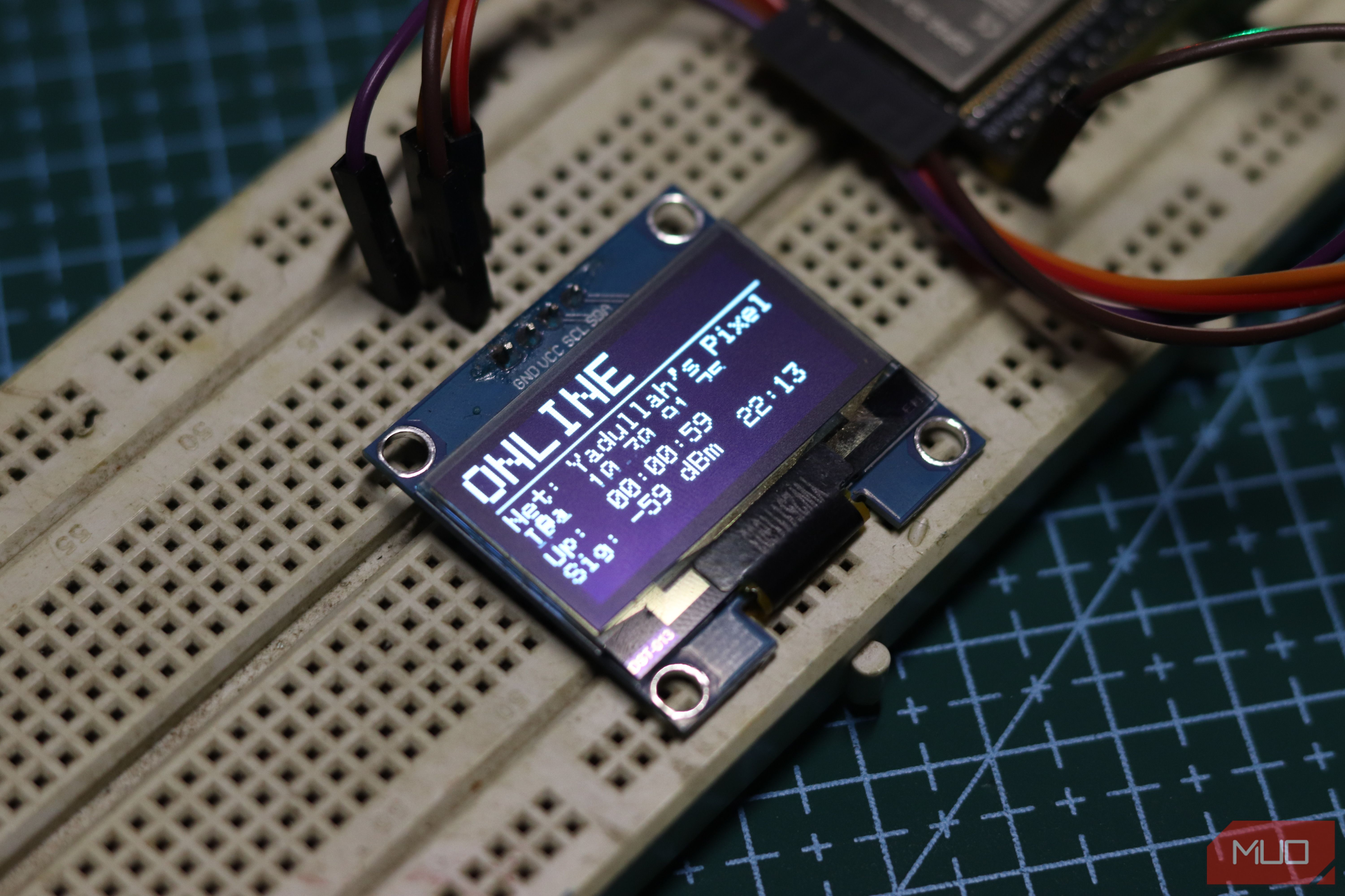 OLED display showing network stats from ESP32.