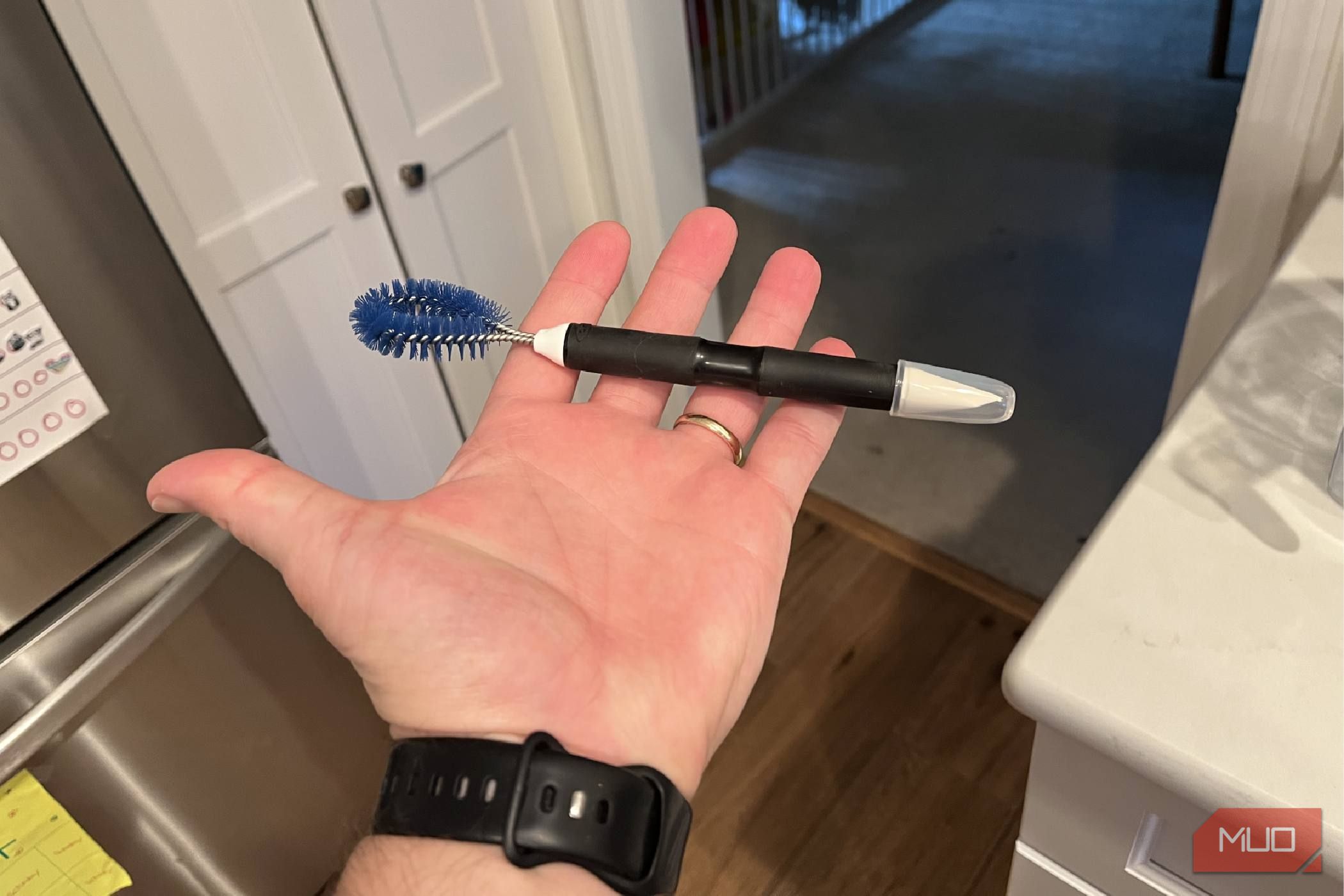 The wire brush of the OXO Good Grips Kitchen Appliance Cleaning Set