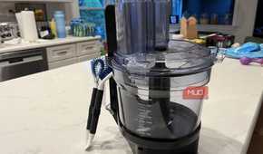 The OXO Good Grips Kitchen Appliance Cleaning Set near a Vitamix