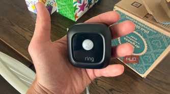 Ring Mailbox Sensor motion unit held in hand
