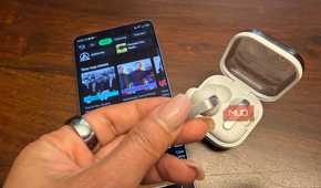 The Samsung Galaxy Buds4 pro with the Samsung Galaxy S26 Ultra showing Spotify.