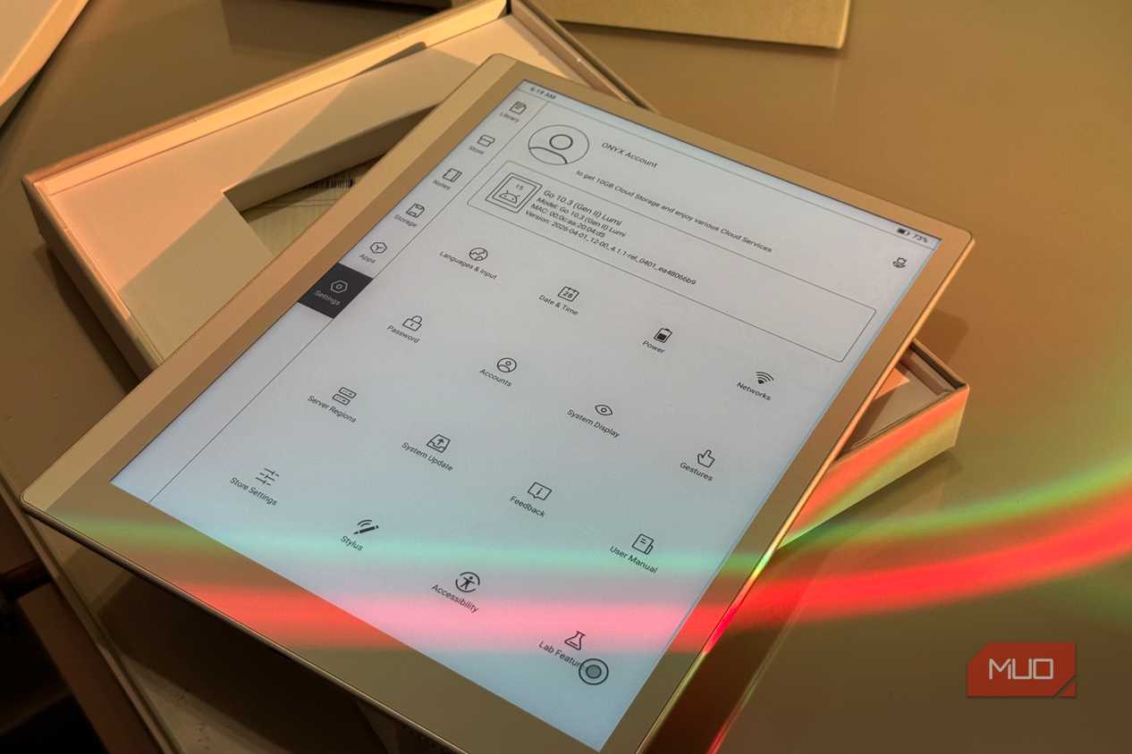 tablet device displaying app menu with various icons and options in wooden holder with colored light reflection