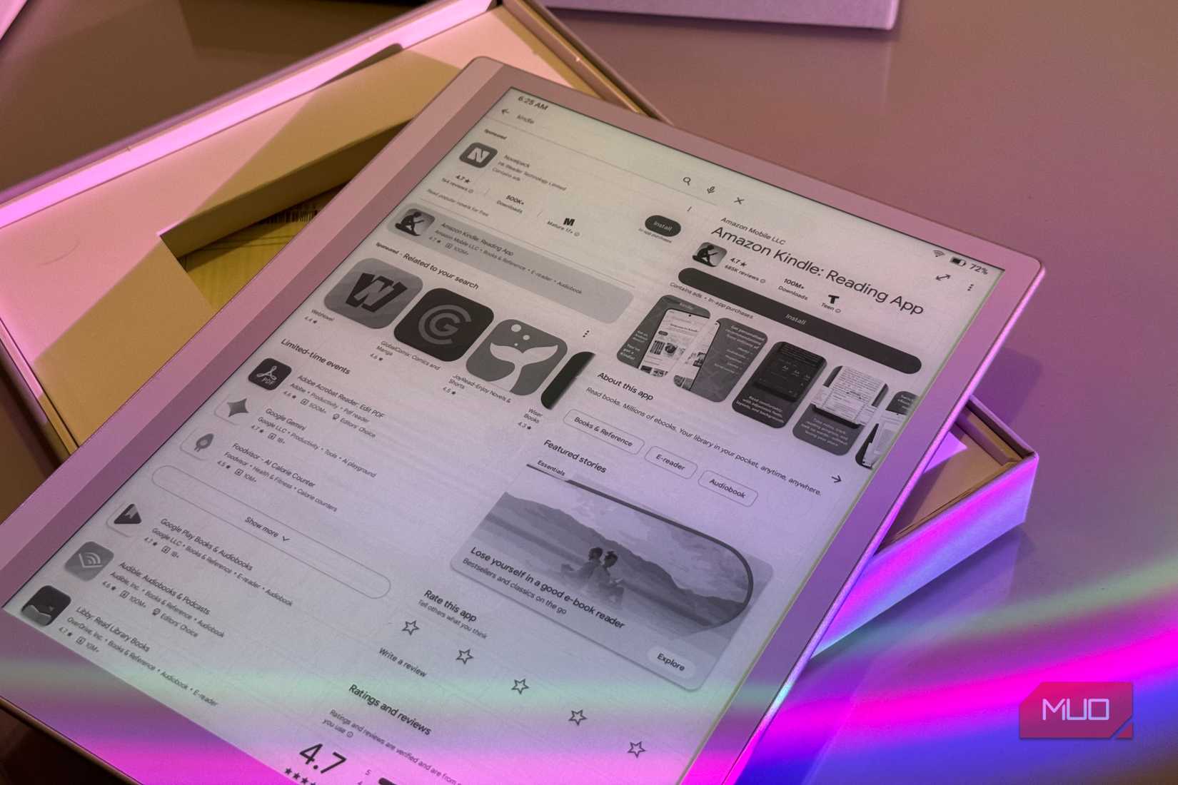 tablet display showing amazon kindle reading app with colorful pink and purple ambient lighting