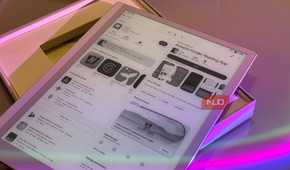 tablet display showing amazon kindle reading app with colorful pink and purple ambient lighting