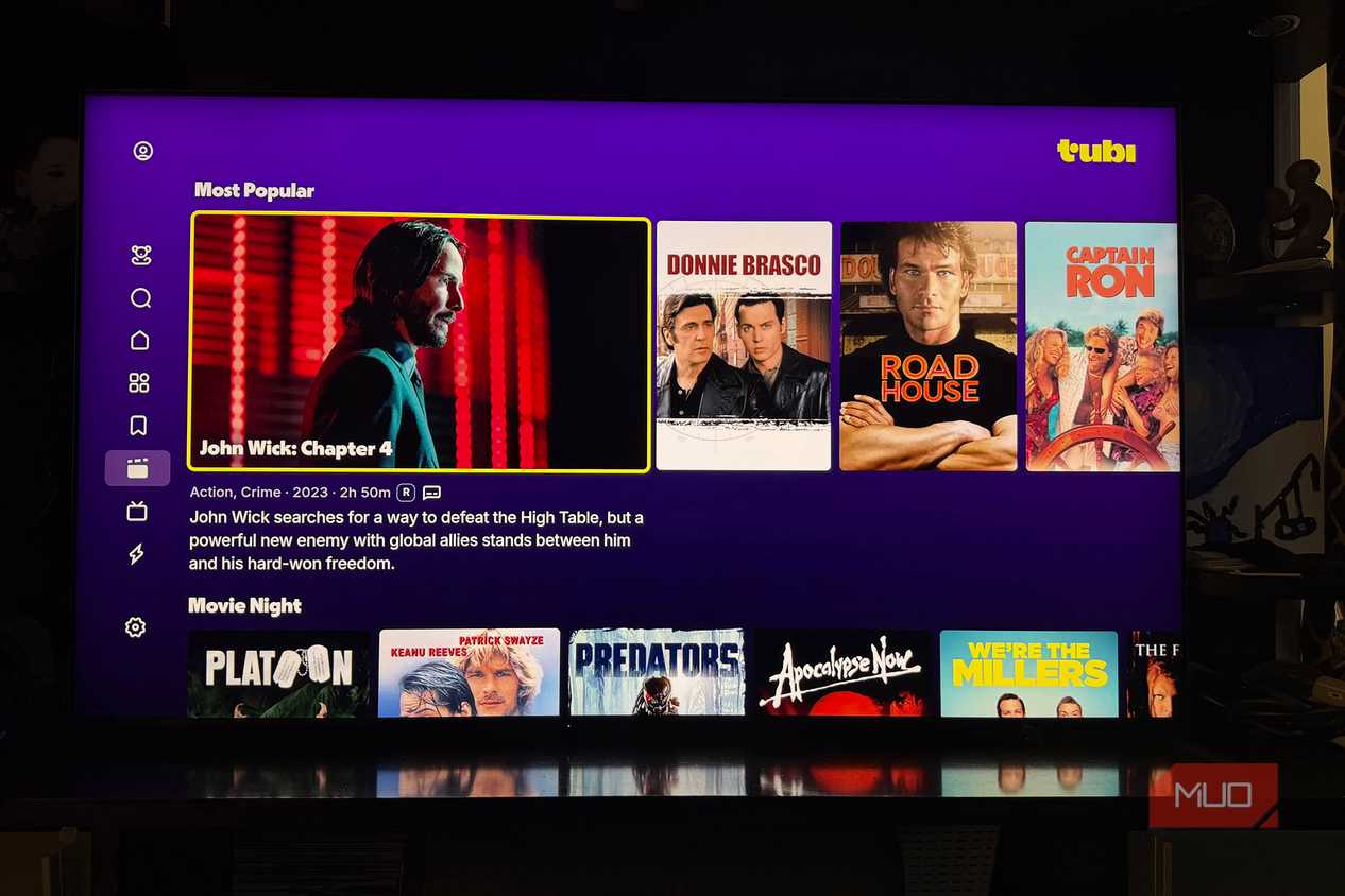 The Tubi app on a TV showing popular movies.