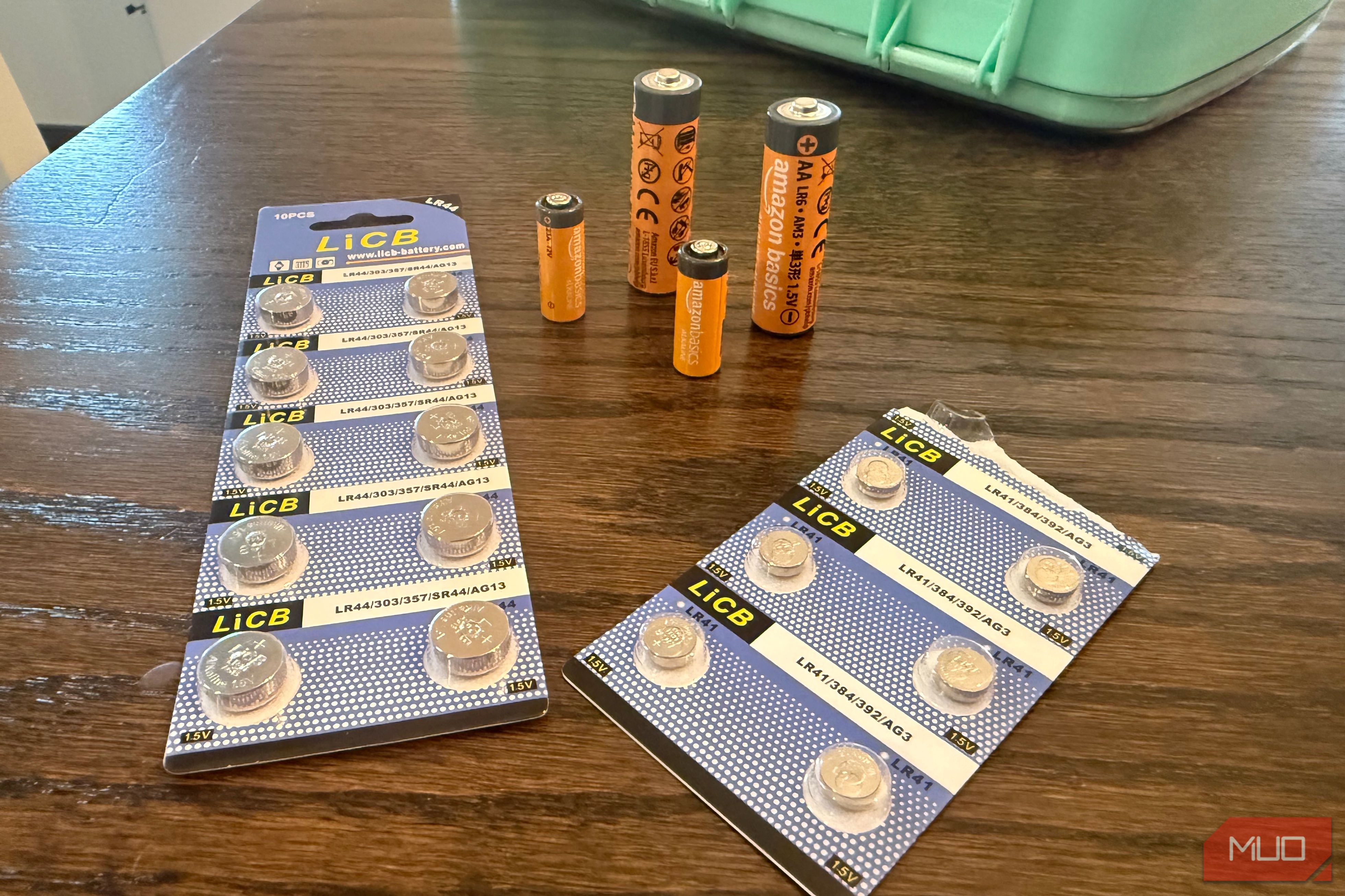 various batteries on table button AA