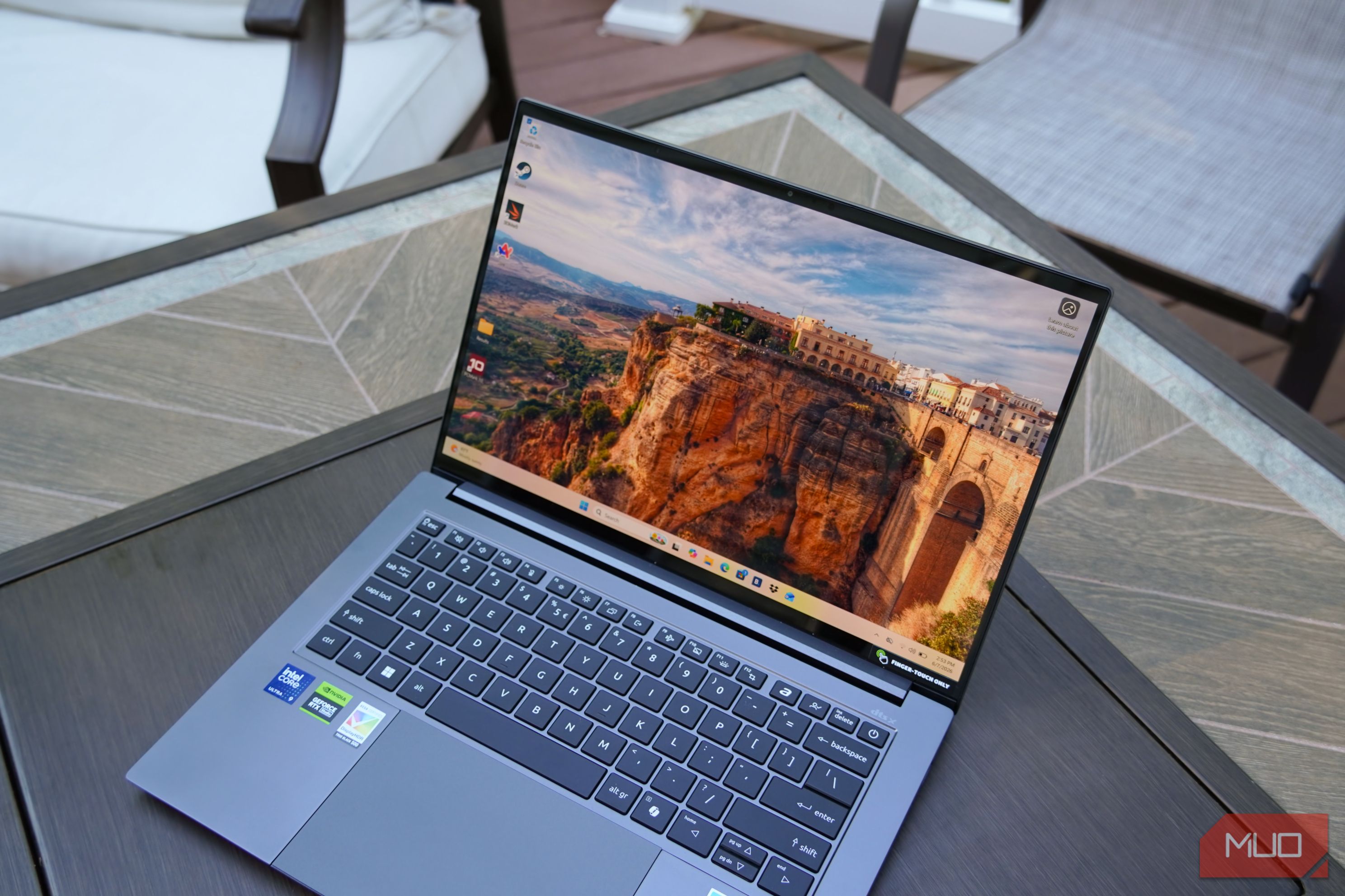 A wide shot of the Acer Swift X 14 display and keyboard.