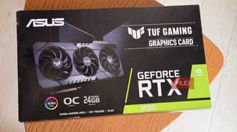 ASUS TUF Gaming GeForce RTX 3090 graphics card box on a round wooden table