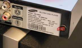 The model sticker of a thrifted Blu-ray player.