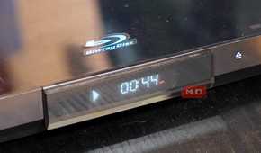 A Blu-ray player running a disc.