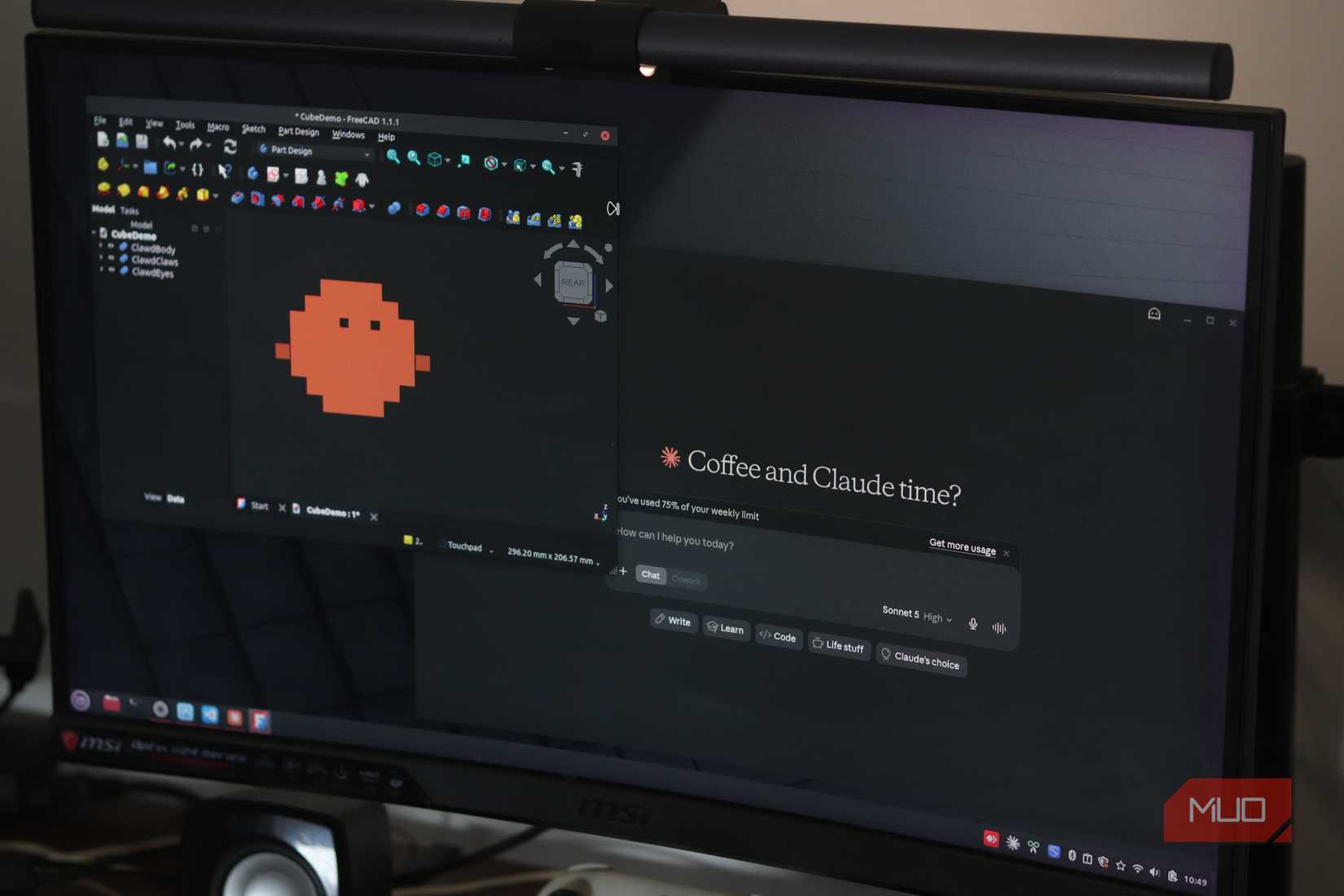 Claude running with FreeCAD in the background connected via MCP server.