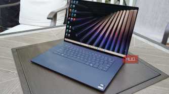 The XPS 16 display showing the Windows 11 home screen.