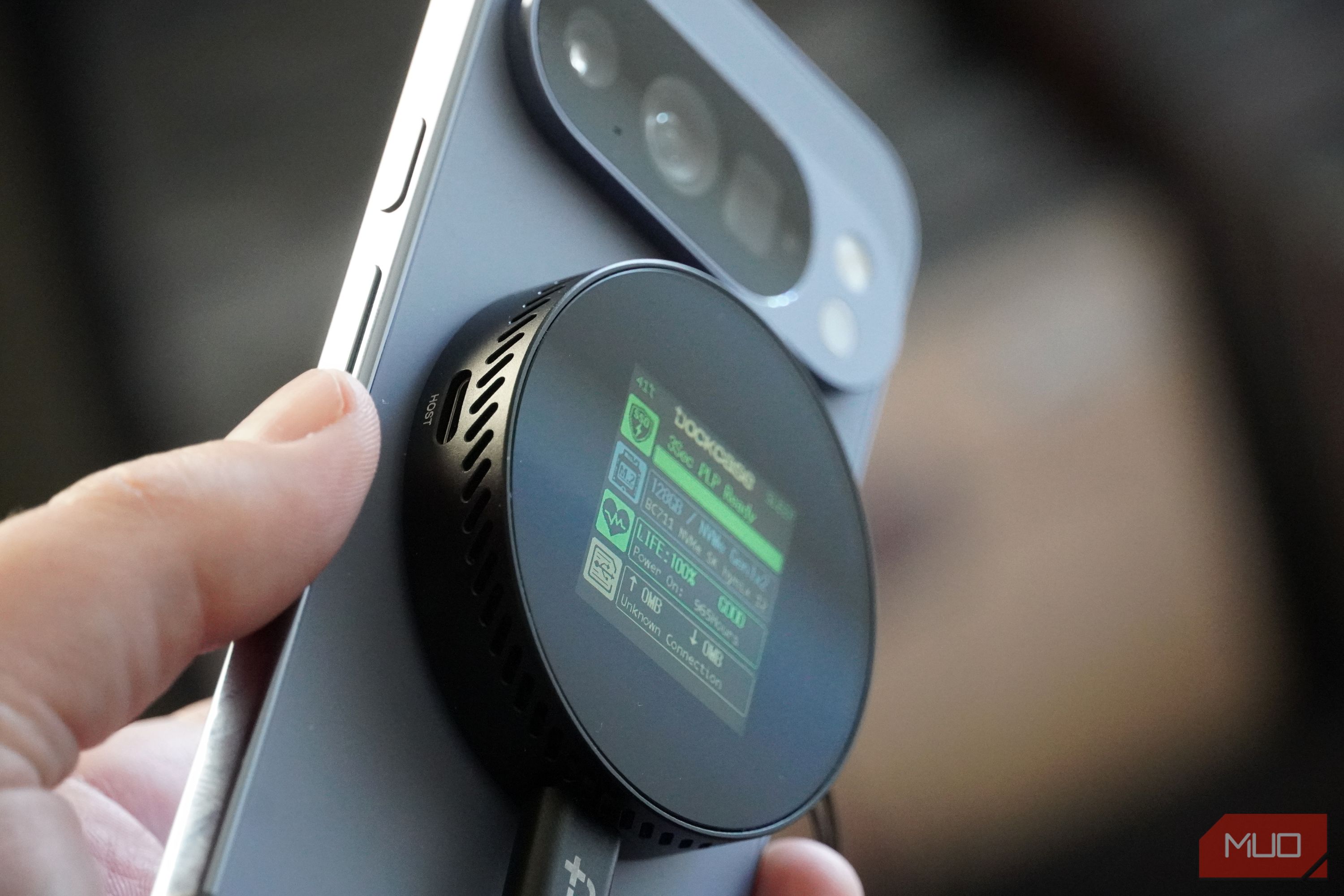 A side view of the Dockcase SSD on a phone.