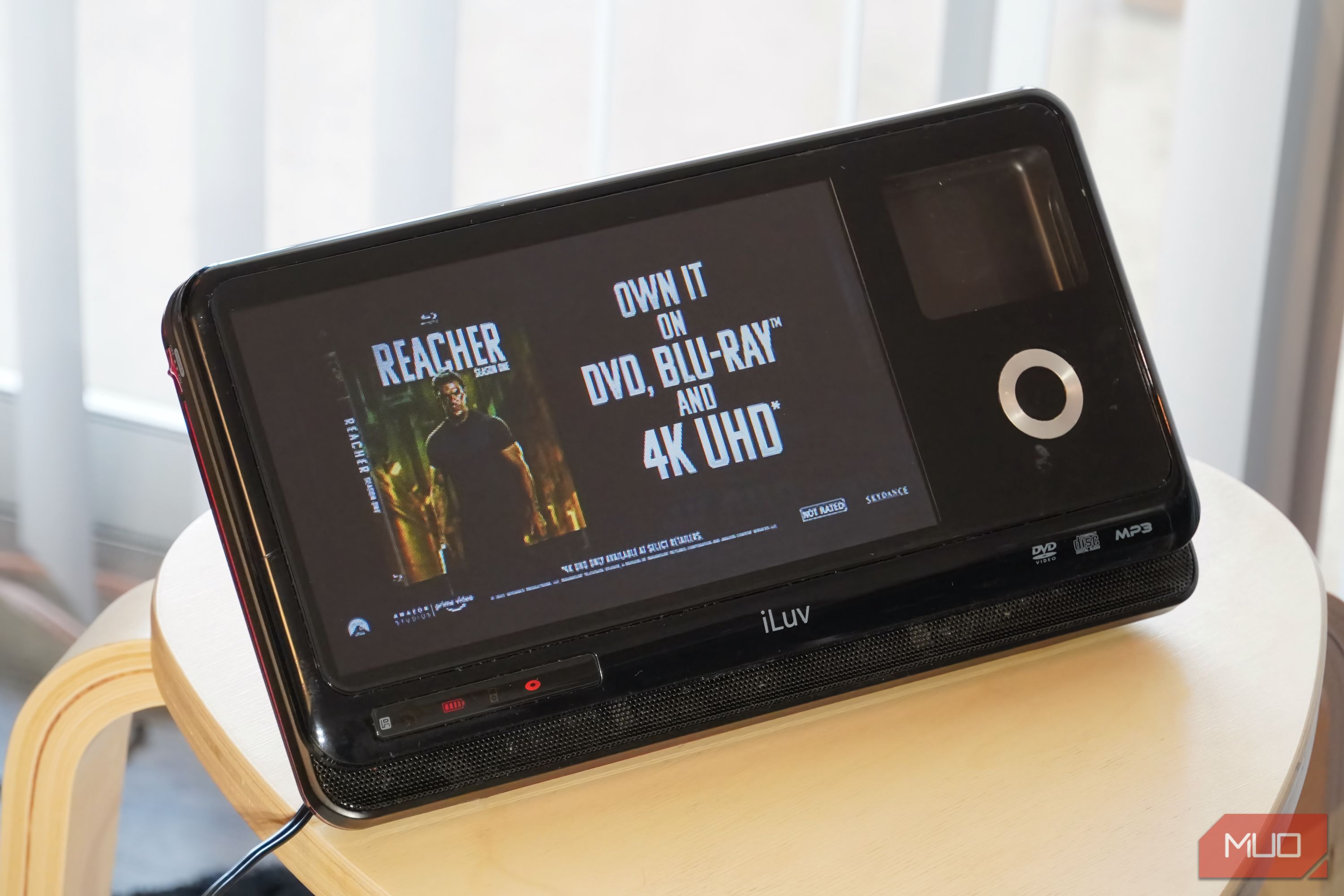 A trailer advertising DVD, Blu-ray, and 4K UHD formats.