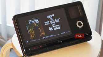 A trailer advertising DVD, Blu-ray, and 4K UHD formats.