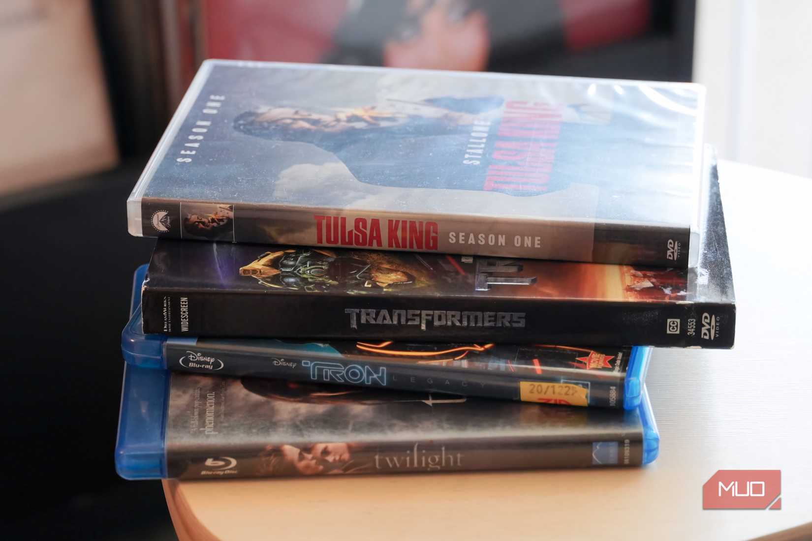 A stack of Blu-ray and DVD cases.