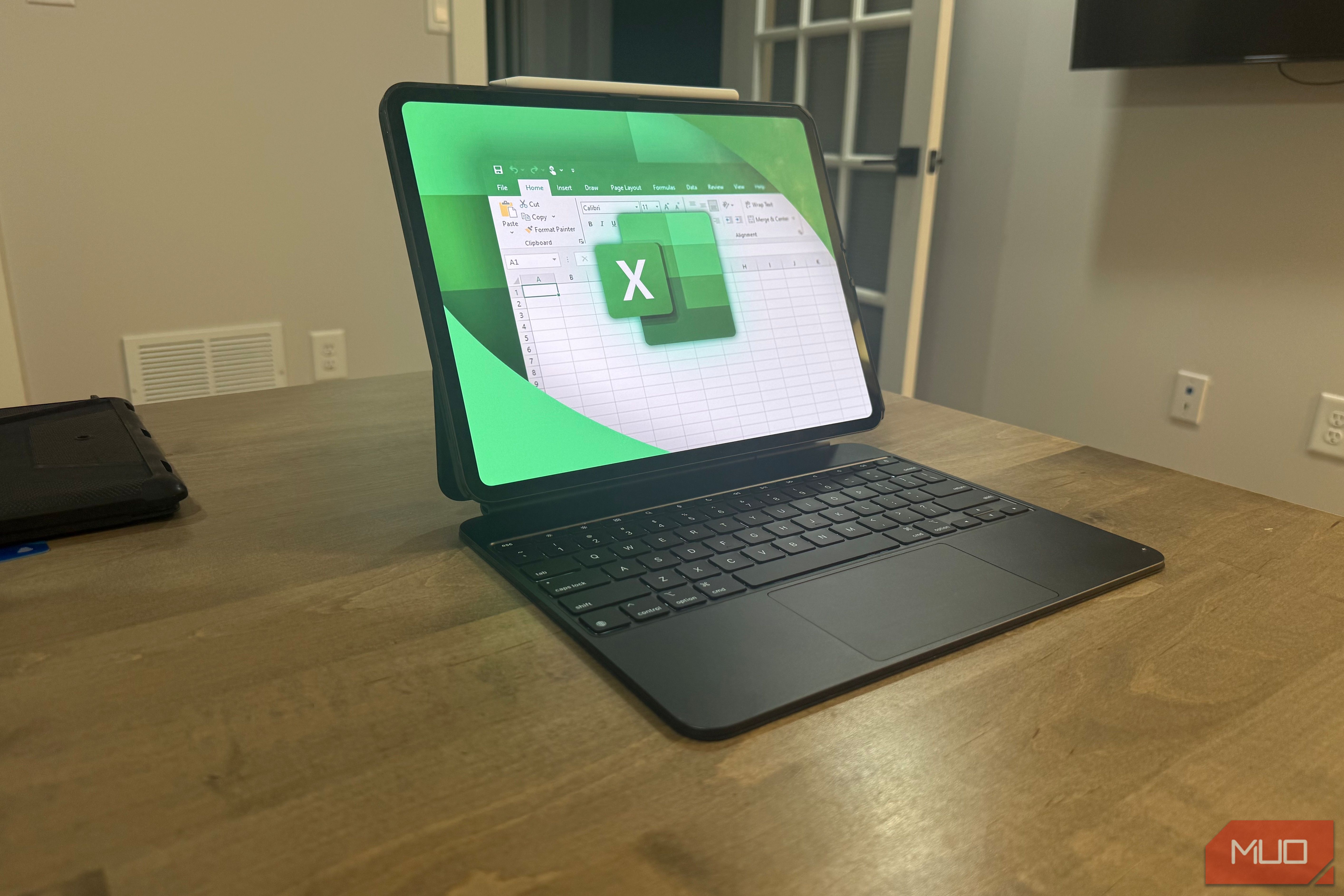 excel on ipad pro on wooden desk