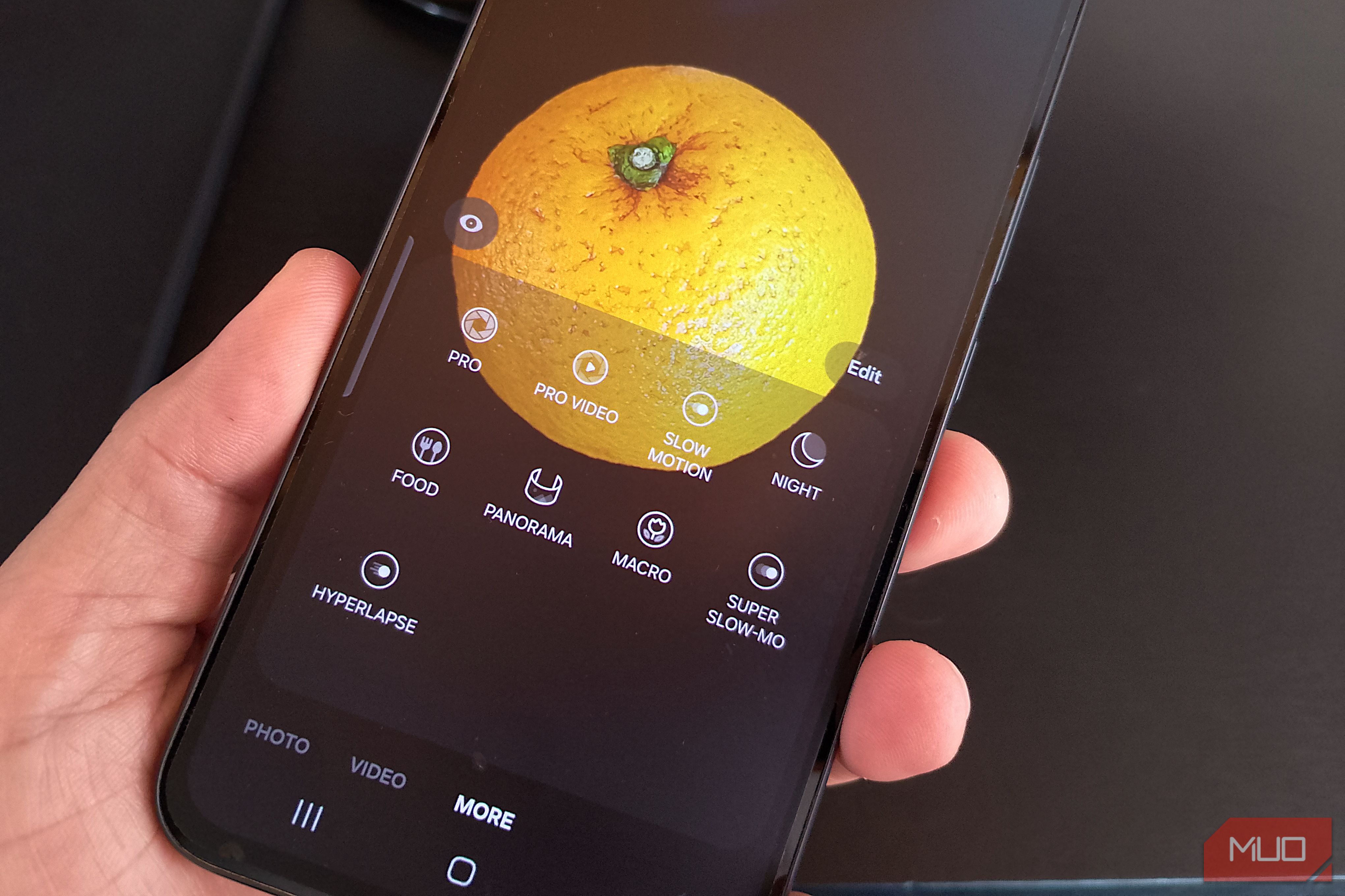 Galaxy phone showing Food mode while taking a pic of an orange