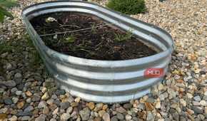 Galvanized Raised Garden Bed With Freshly Planted Soil-1