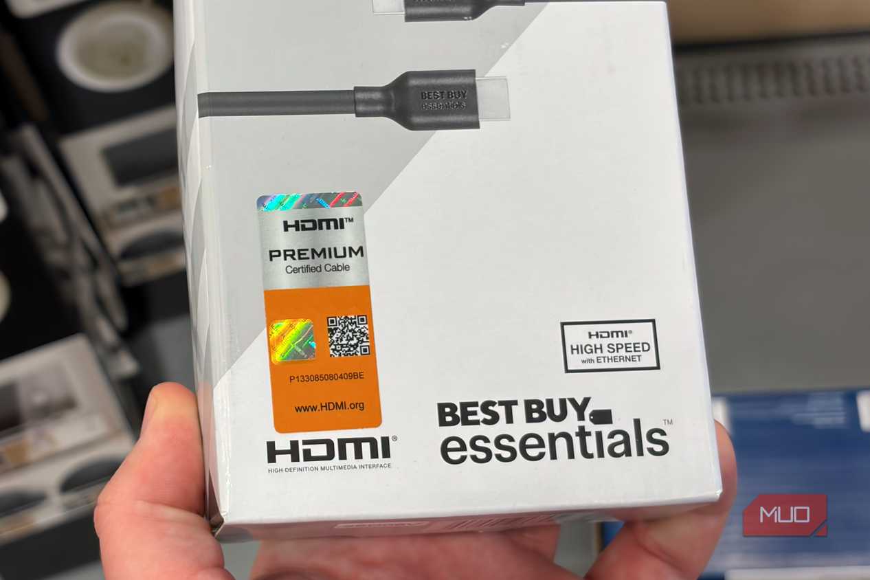 A close-up of the HDMI certification stickers on a box.