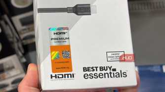 A close-up of the HDMI certification stickers on a box.