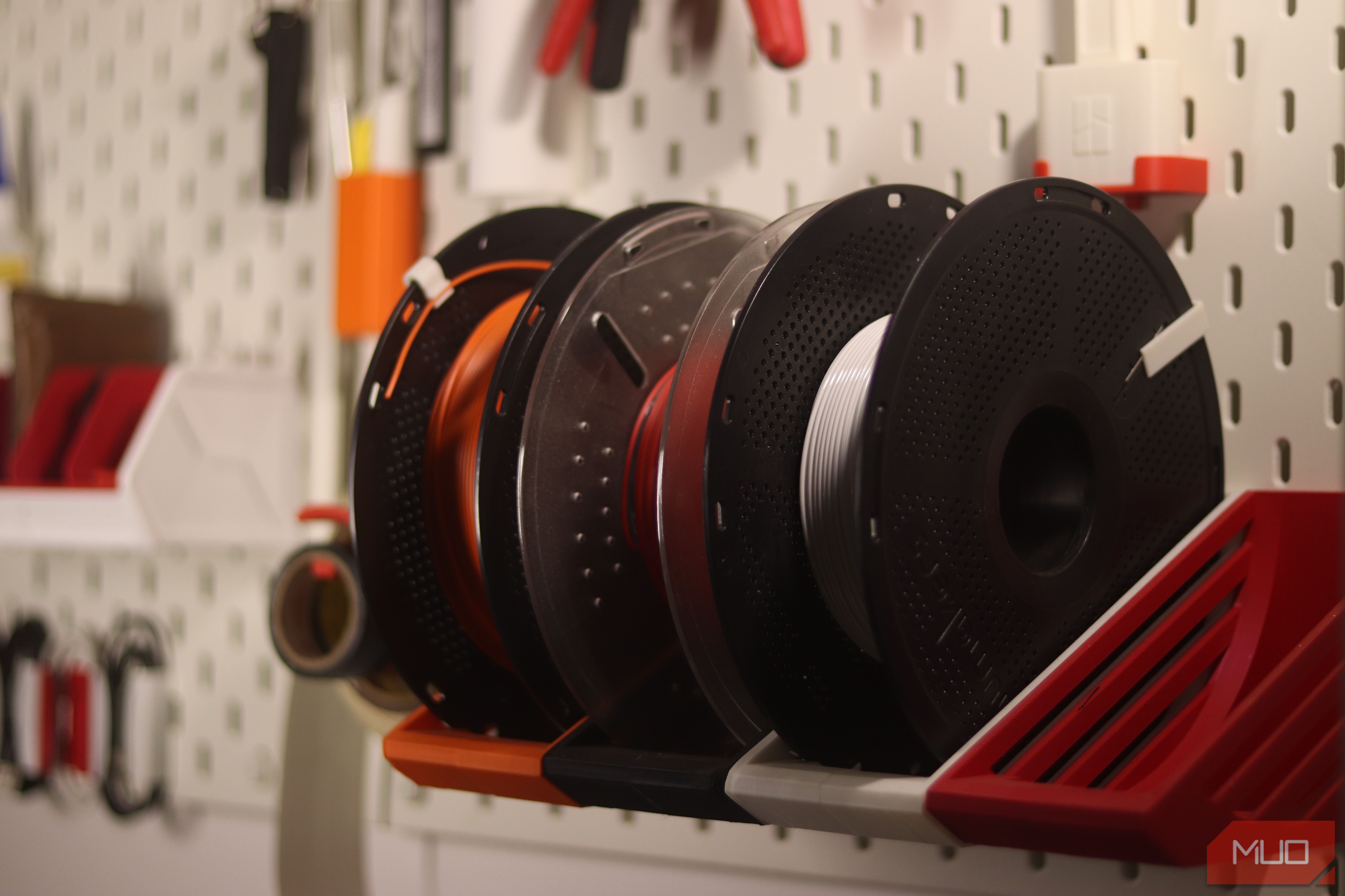 Ikea Skadis with 3D printed spool holder.