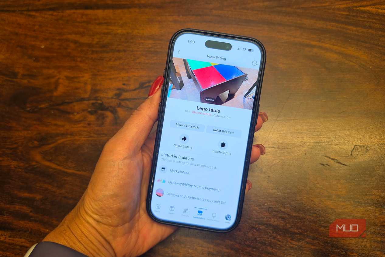 An iPhone in hand showing a listing on Facebook Marketplace.