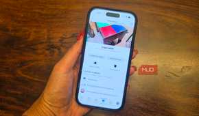 An iPhone in hand showing a listing on Facebook Marketplace.