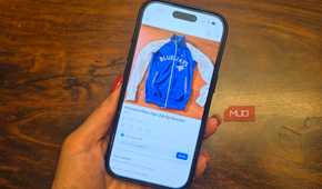 An iPhone in hand showing a listing on Facebook Marketplace.