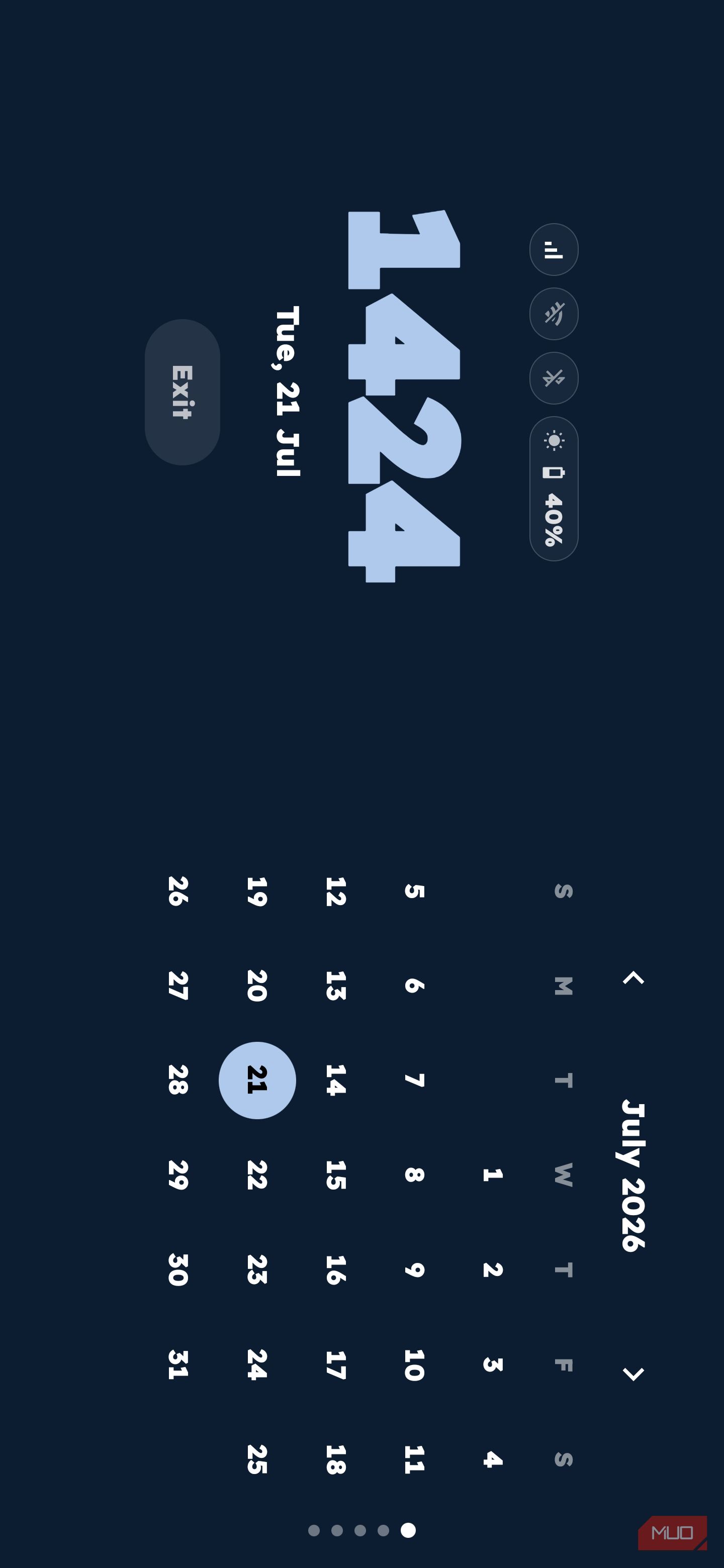 Landscape view of Key Launcher showing a large clock, status icons, and a full calendar grid for July 2026 on a dark background