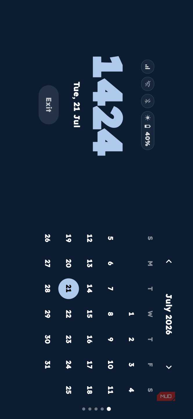 Landscape view of Key Launcher showing a large clock, status icons, and a full calendar grid for July 2026 on a dark background