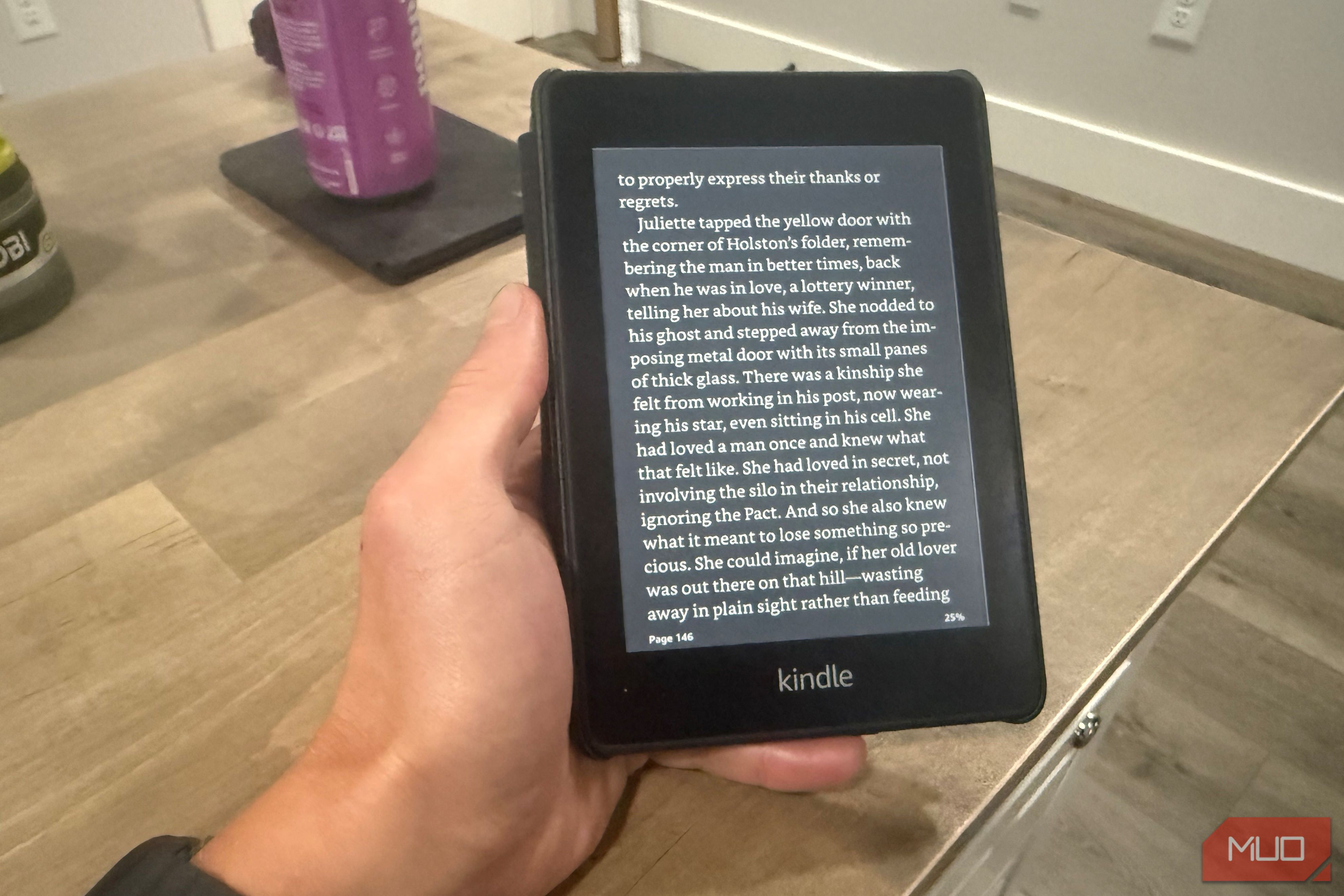 kindle paperwhite in hand