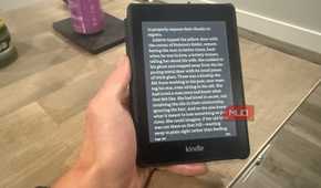 kindle paperwhite in hand