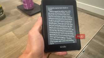 kindle paperwhite in hand