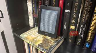 kindle paperwhite on bookcase