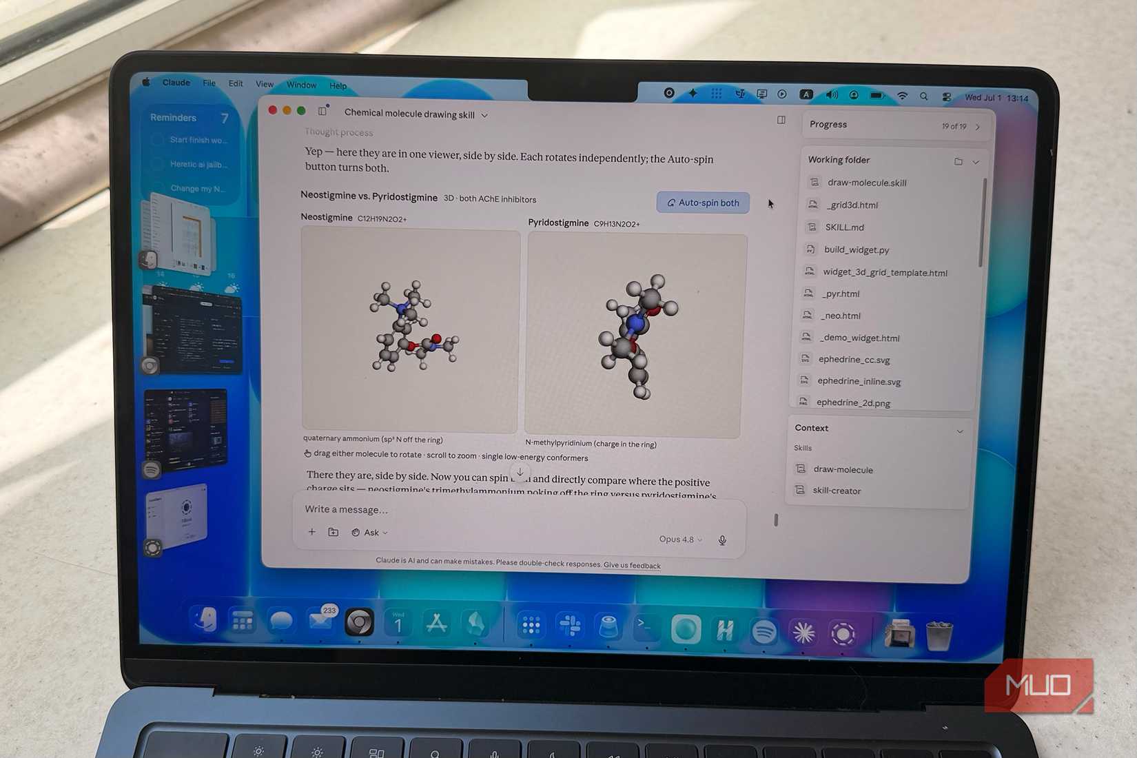 Laptop screen showing Claude comparing two molecules in 3D