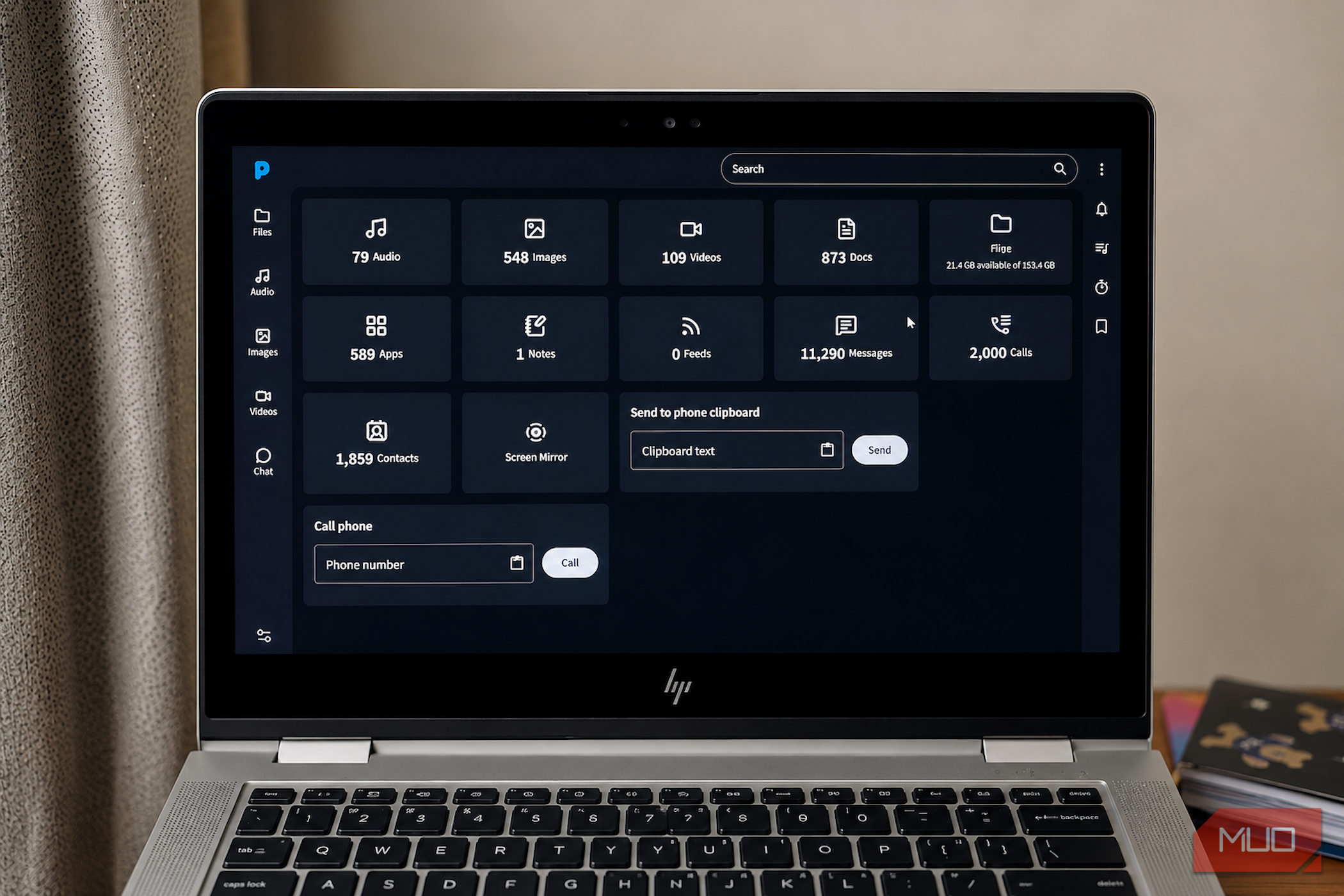 Laptop screen showing phone management application.