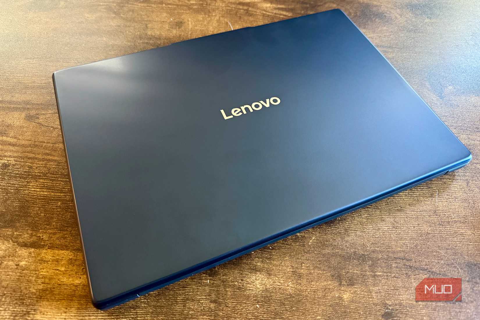 Lenovo IdeaPad Slim 3i closed on coffee table
