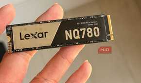 Lexar NQ780 NVMe SSD held between fingers