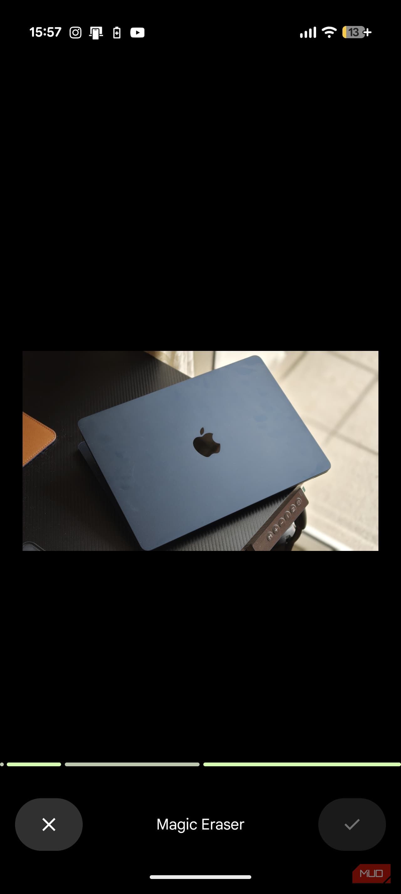 Magic eraser in progress on Google Photos