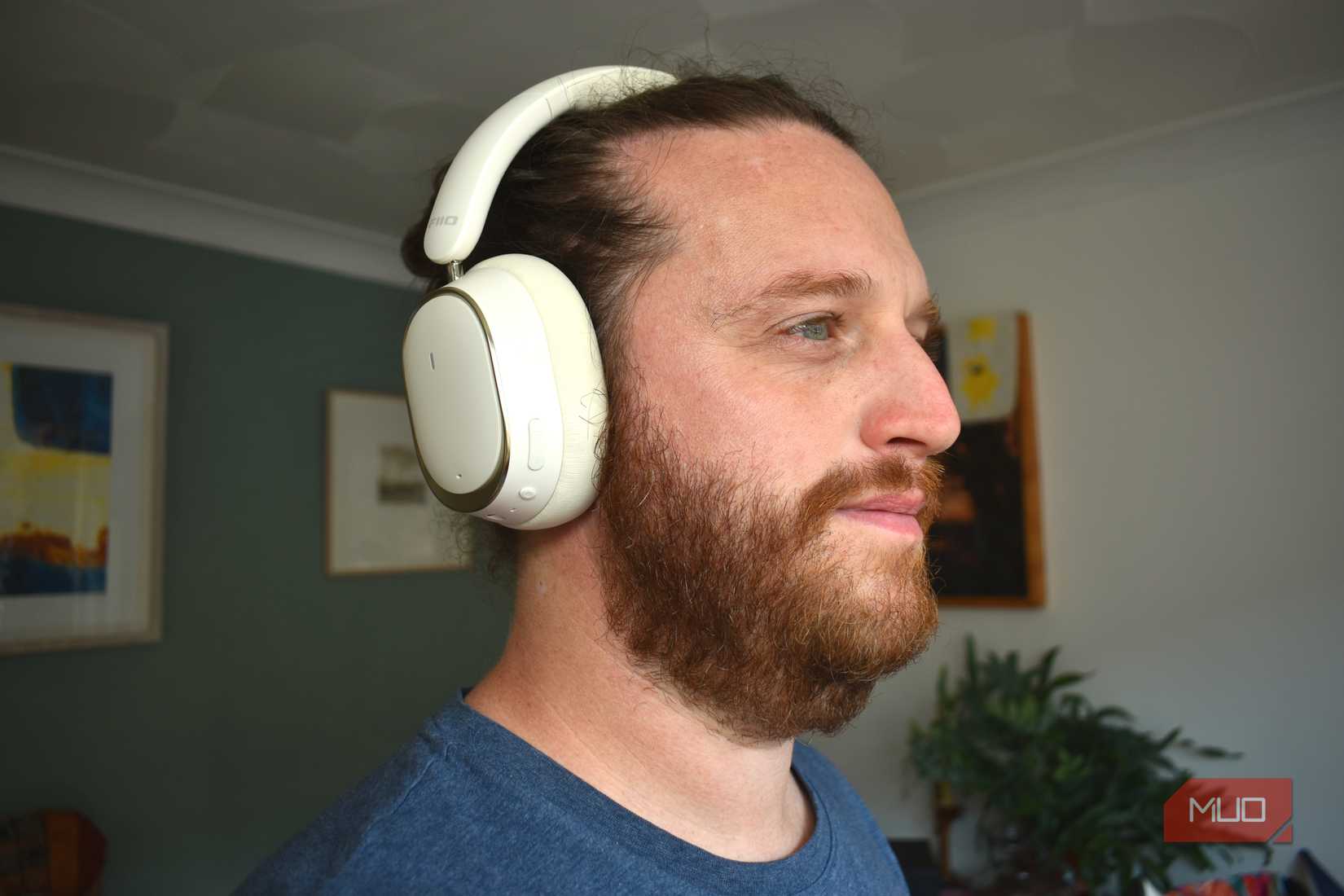 man wearing fiio eh13 headphones