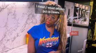 A woman talking on Big Brother with captions in front of her face.