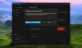 OneDrive settings showing unlink account confirmation dialog