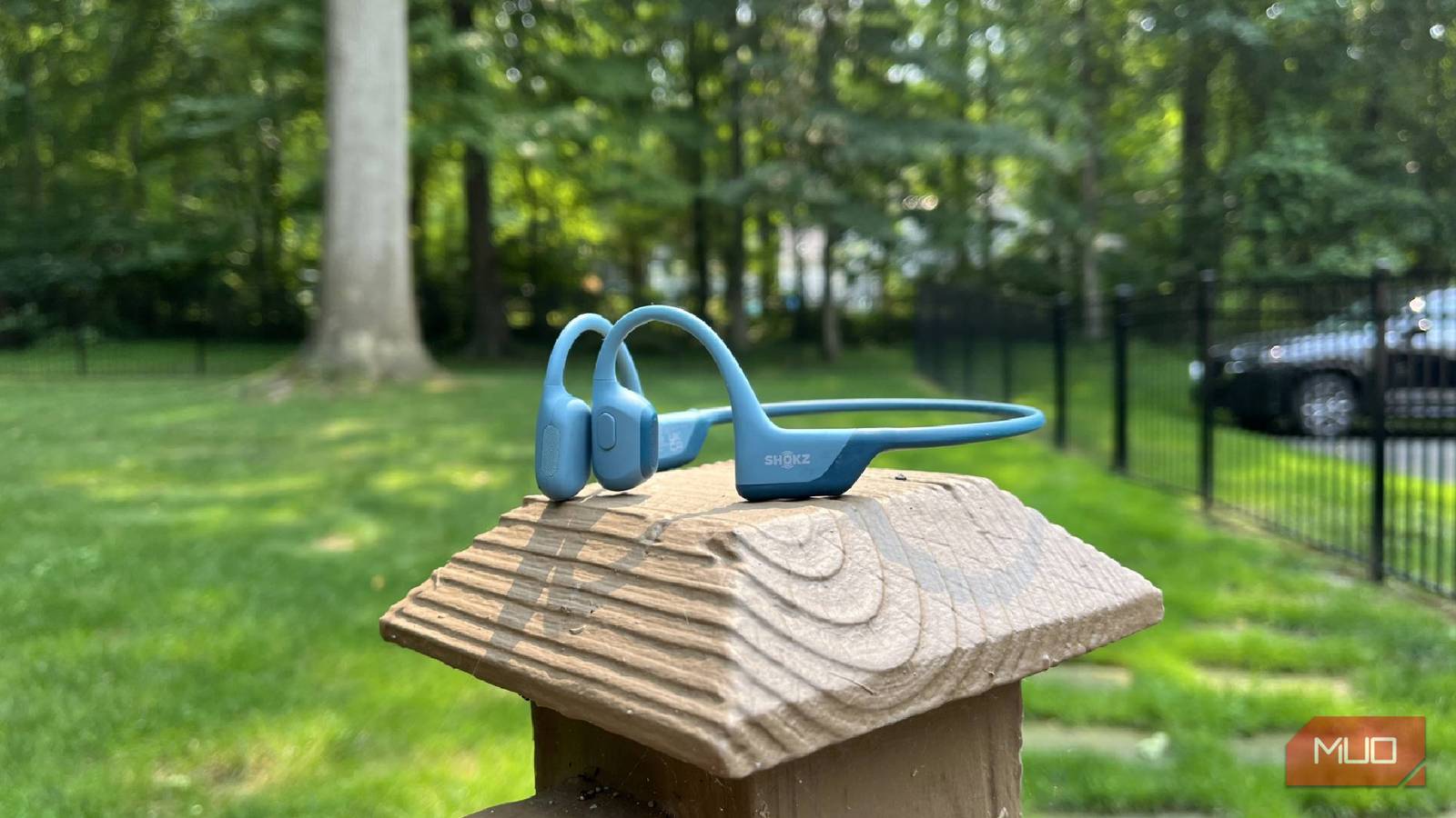 I don’t do any work outside without this gadget (my bone conduction headphones)