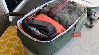 An angled view of gear in a Peak Design travel bag.