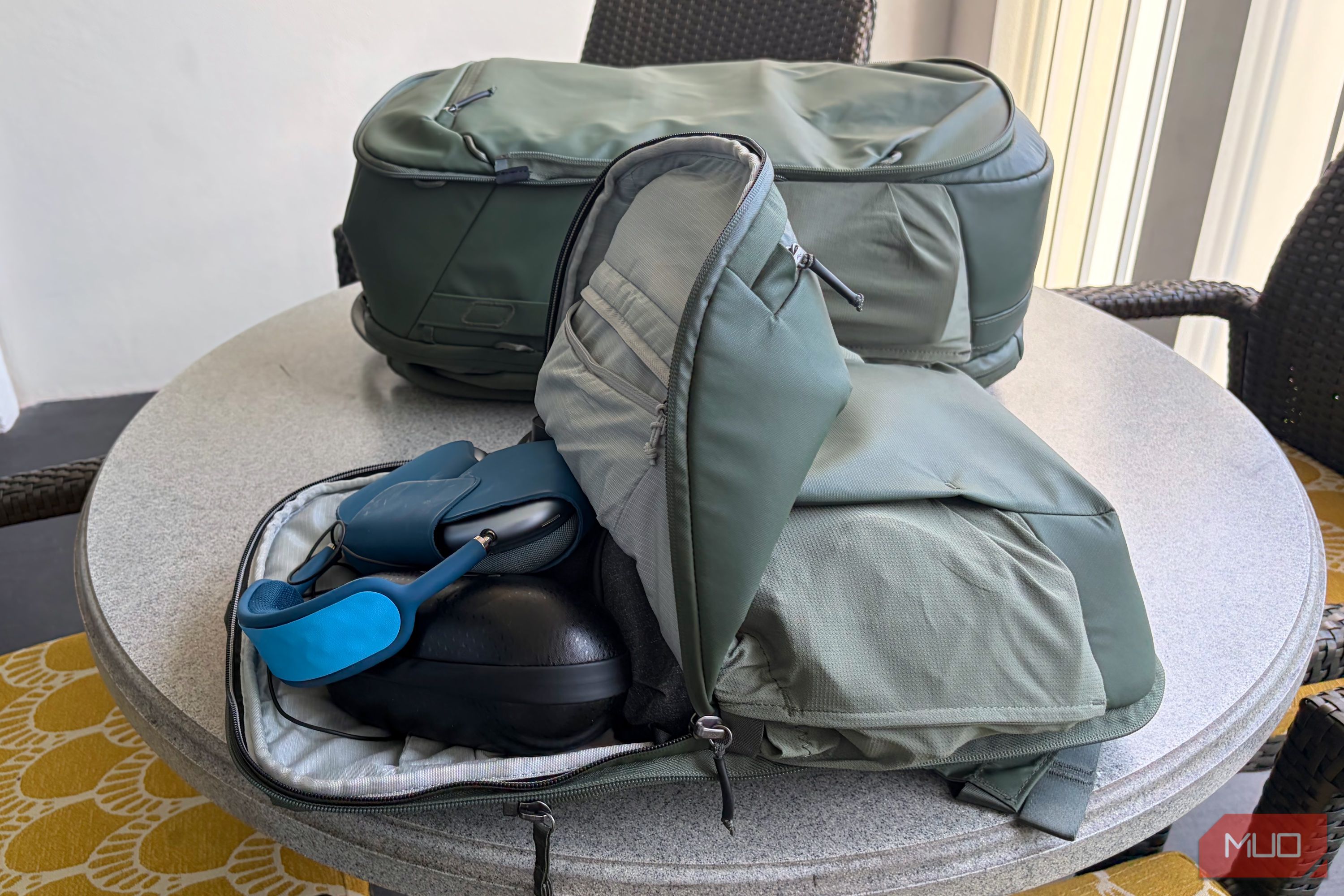 Gear in the daypack of the Peak Design 2-in-1 travel bag.