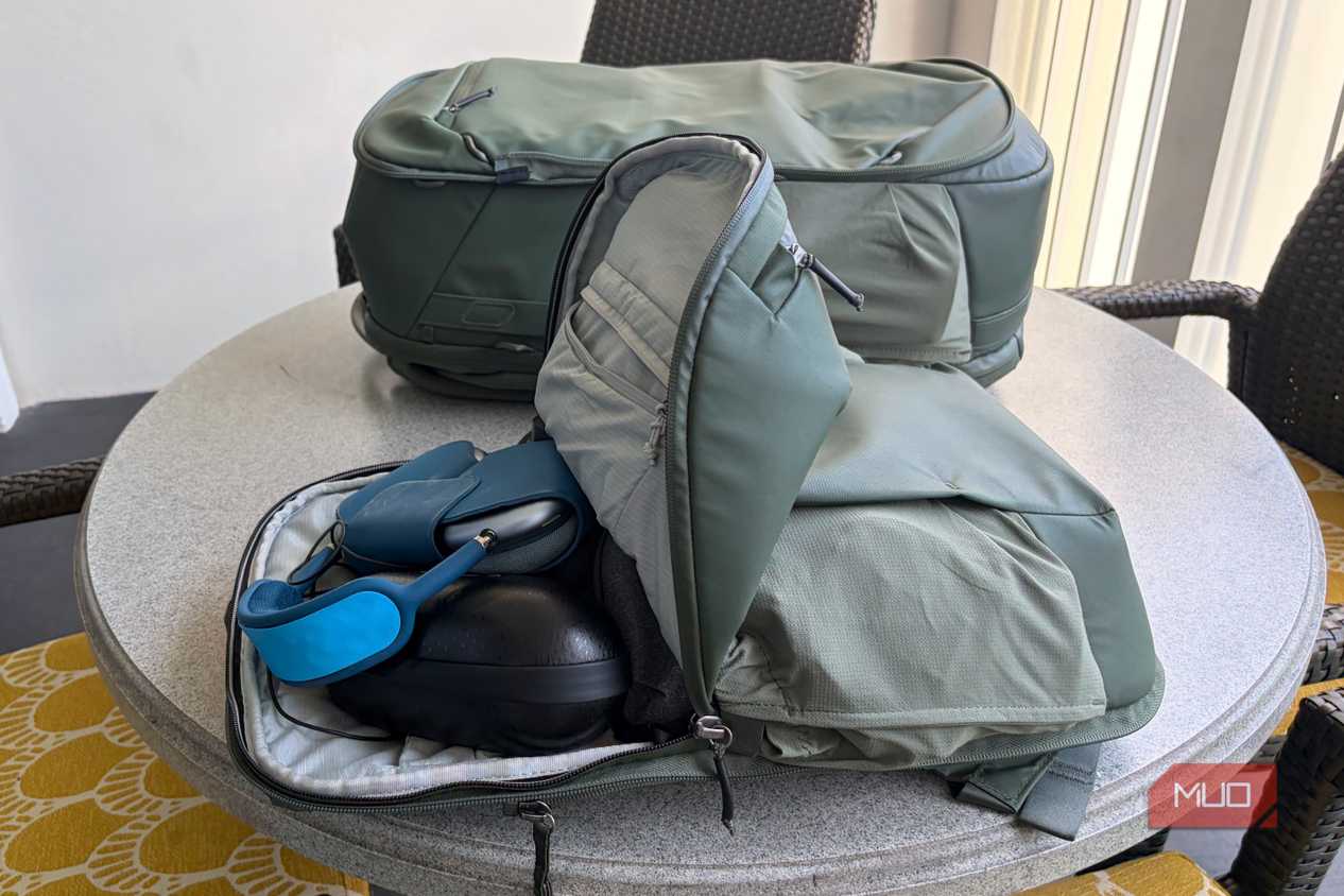 Gear in the daypack of the Peak Design 2-in-1 travel bag.