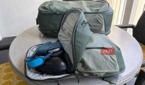 Gear in the daypack of the Peak Design 2-in-1 travel bag.