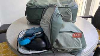 Gear in the daypack of the Peak Design 2-in-1 travel bag.
